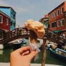 person holding ice cream cone
