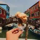 person holding ice cream cone