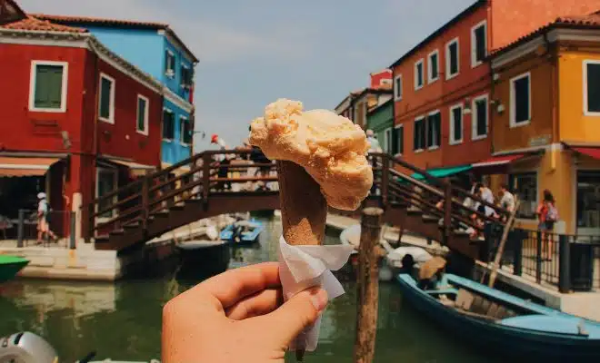 person holding ice cream cone